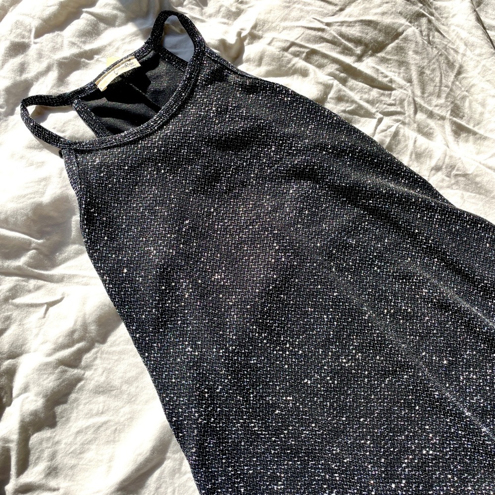 Going out black dress that’s giving it a sparkly look to it🔥